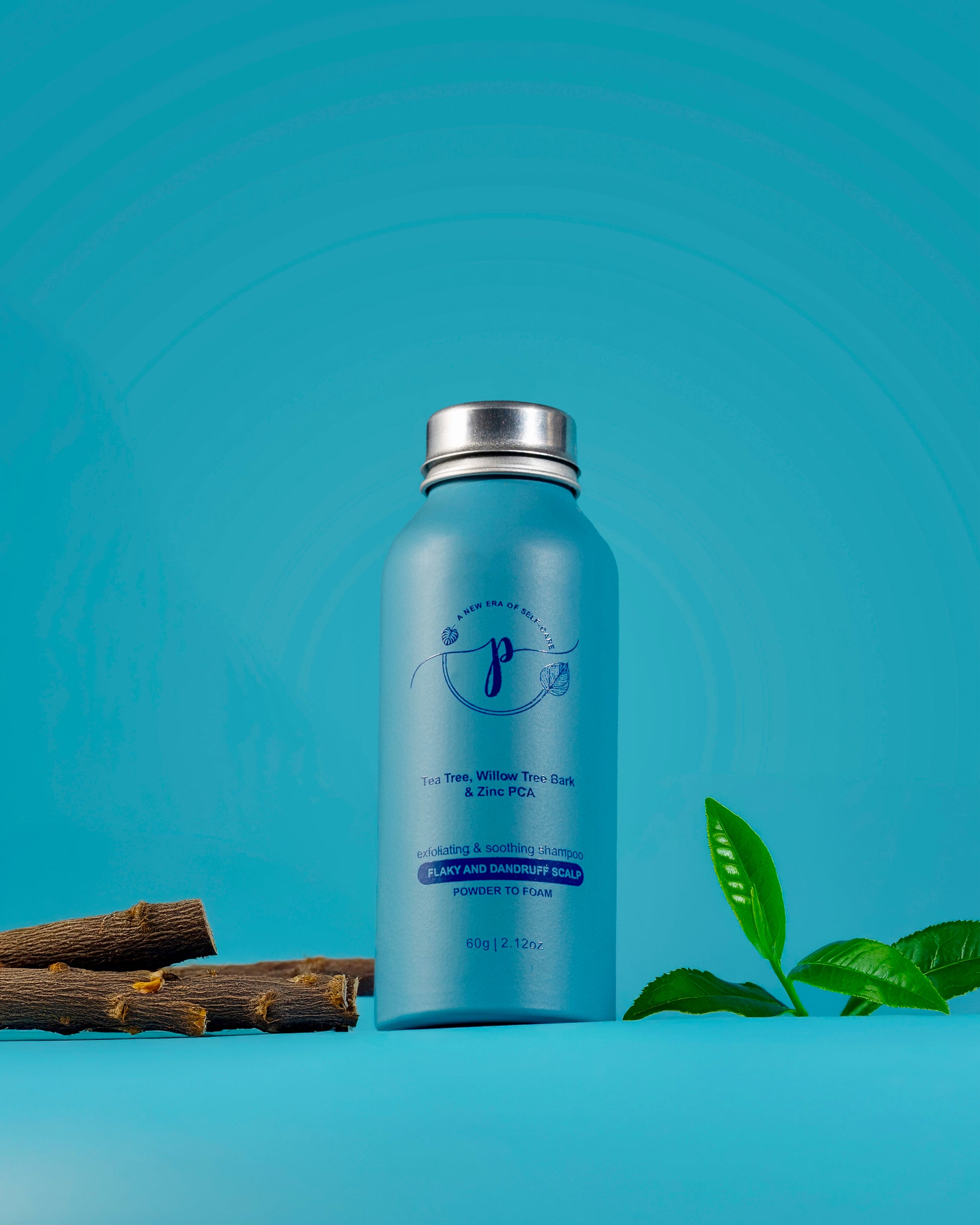 "Powder-to-foam vegan anti-dandruff shampoo with tea tree oil, salicylic acid, and zinc PCA for itchy scalp"